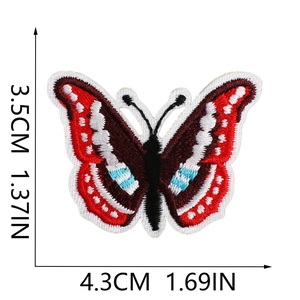 Detail view of blue butterfly embroidery patch with dimensions 3.5cm height and 4.3cm width