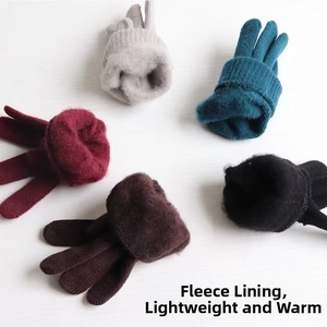 Detail showing brushed fleece lining and fine knit texture of warm thermal gloves