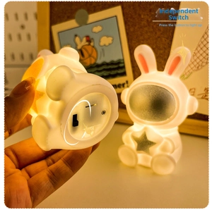 Detail of the bottom switch and battery compartment of the cute astronaut rabbit night light
