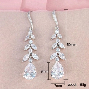 Long silver leaf tassel earrings with pear-shaped cubic zirconia and size dimensions