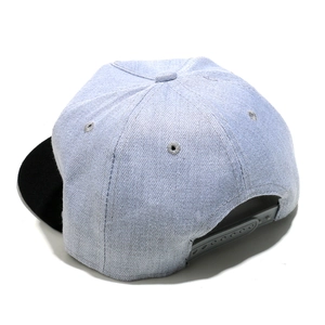 Detail view of the adjustable grey snapback closure on a flat brim hip hop baseball cap