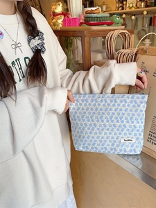 Neceser de lona con estampado floral azul y cierre de cremallera para cosméticos mujer