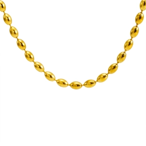 Minimalist gold bead necklace with polished metallic luster on a clean white background