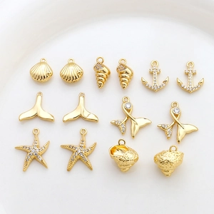 14k gold plated marine pendants set featuring shell whale tail and anchor designs