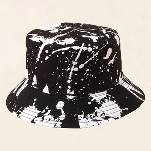 Trendy black and white ink splash bucket hat with minimalist street style design
