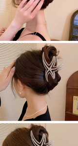 Detailed back view of a silver starfish hair claw clip with pearls and rhinestones