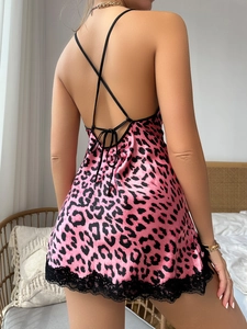 Detailed back view of pink leopard satin sleepwear with lace hem and cross straps