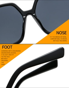 Detail view of ergonomic nose pads and temples on high-quality oversized black sunglasses