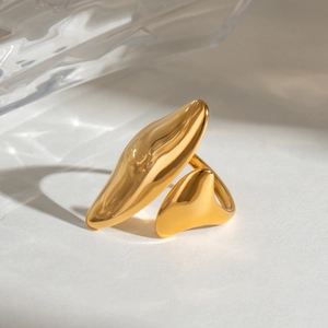 Irregular adjustable open ring with gold abstract lava design on textured background