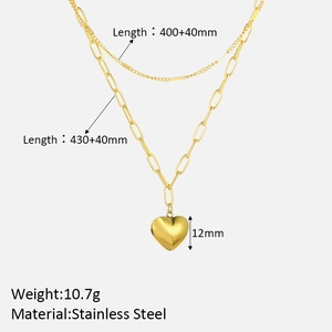 Detailed technical diagram showing dimensions of a layered gold heart pendant necklace