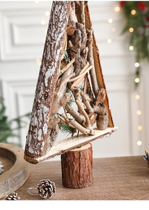 Close-up of handmade wooden Christmas tree made from natural bark and branches