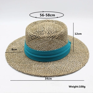 Flat top wide brim straw hat with light blue ribbon and detailed woven texture