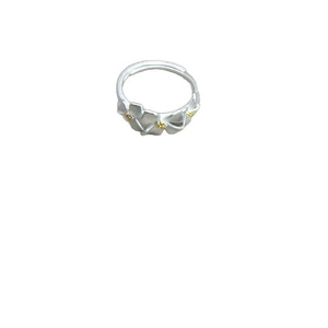 Minimalist silver adjustable ring with delicate floral patterns and gold accent details