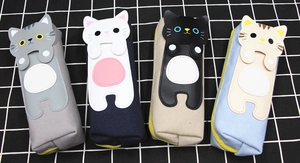 Detail view of four canvas cat pencil cases in grey, navy, beige and light blue