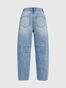 Back view of light blue high-waisted wide-leg denim jeans with vintage barrel cut