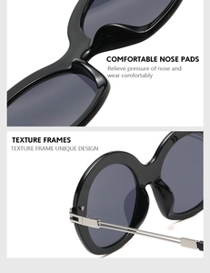 Detail of ergonomic wide nose pads and metallic hinges on vintage round sunglasses