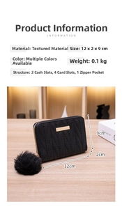 Short quilted wallet with pompom pendant, featuring card slots and a zipper pocket