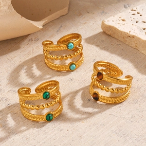 Bagues dorées à trois couches avec pierres de malachite, turquoise et oeil de tigre