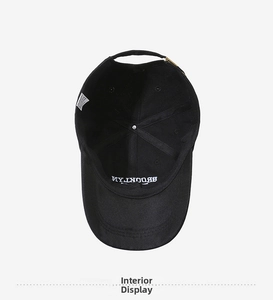 Detailed interior view of a black cotton baseball cap showing lining and embroidery