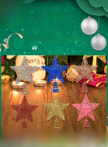 Close-up of glittery wrought iron Christmas tree topper stars in six assorted colors
