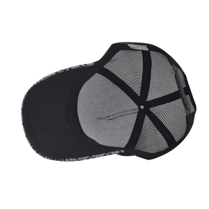 Detail view of the interior lining and adjustable snapback of the black mesh baseball cap