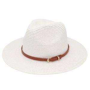 Detail of cream Panama hat with fine straw texture and brown leather buckle band