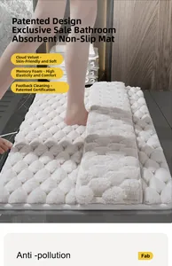 Detail view of cloud velvet memory foam bath mat with 3D bubble texture for water absorption