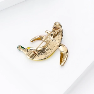 Cute banana fruit brooch in gold plating with yellow enamel and sparkling rhinestones