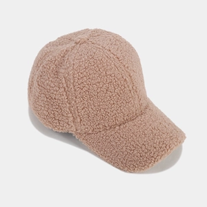 Detail of mauve sherpa baseball cap showing thick fleece texture and warm winter material