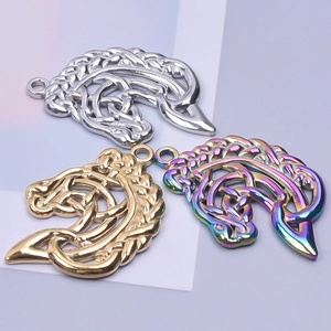 Three Celtic knot horse head pendants in silver, gold, and rainbow finishes