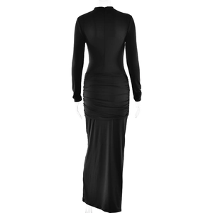 Detail view of the back of a black long-sleeved bodycon dress featuring pleated ruching