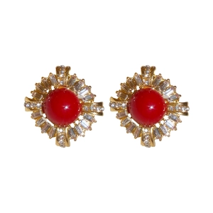 French vintage silver needle stud earrings with red zircon in a gold starburst frame