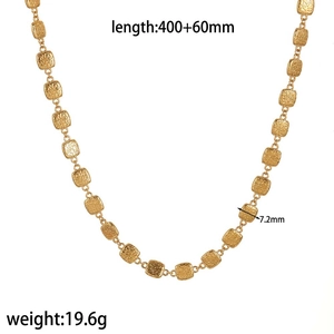 Detail of golden geometric square link necklace with size specs on white backdrop
