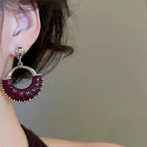 Retro silver and burgundy leather hoop earrings with bead accents for women