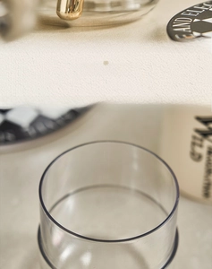 Detail showing the large diameter opening of the transparent travel toothbrush storage case