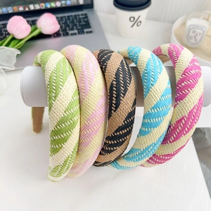 Set of five colorful hand-woven braided headbands with classic checkered patterns