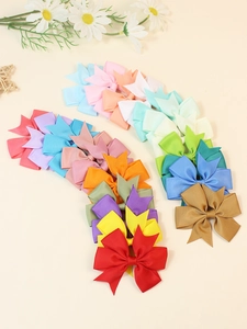 Detailed view of colorful grosgrain ribbon hair bows in a vibrant assortment of candy colors