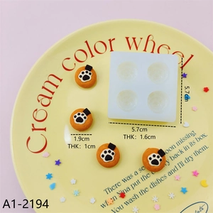 Detailed view of square 4-cavity silicone mold with orange cat paw resin crafts