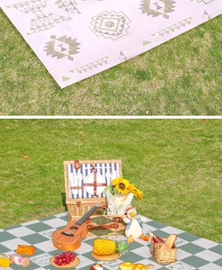 Close-up of geometric and cute bear prints on moisture-proof picnic mats for camping