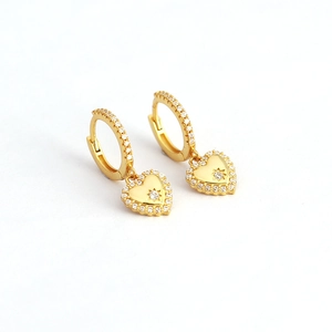 Sparkling gold heart huggie earrings with white zircon and star pattern engraving