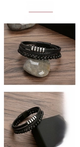 Detail of layered leather bracelet with volcanic stone beads and stainless steel rings