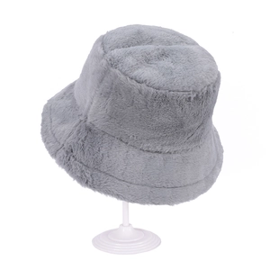 Detailed view of the soft grey plush faux fur texture on a warm winter bucket hat
