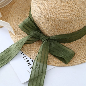 Flat top handmade straw hat with olive green chiffon ribbon and wide brim for sun protection