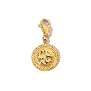 Detailed view of golden devil eye pendant with lobster clasp and hammered texture finish