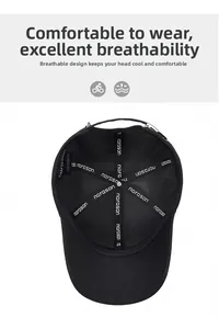 Close-up of the internal structure of a black baseball cap with breathable fabric lining