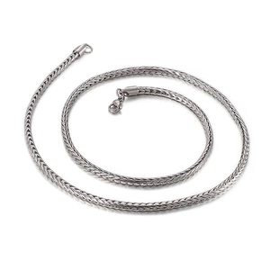 Sleek stainless steel wheat chain necklace in silver finish on a clean white background