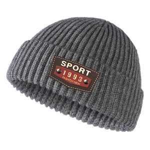 Thick charcoal grey knitted beanie for men and women with vintage sport leather patch