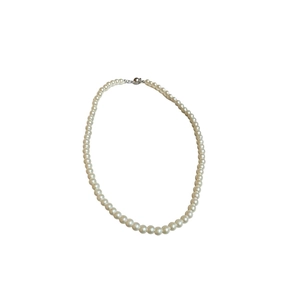 Elegant beaded pearl necklace with silver clasp on white background for women