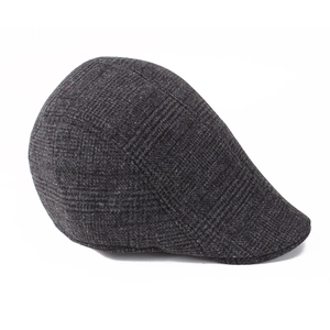 Side view of dark grey plaid flat cap showing fine knit texture and warm winter fabric