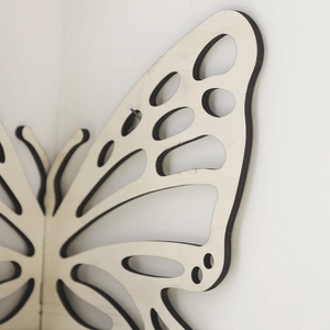 Minimalist butterfly wooden wall shelf with intricate hollowed-out laser-cut details